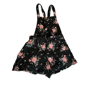 Divided women's size 8 black floral short overalls, inseam 2", length 28"